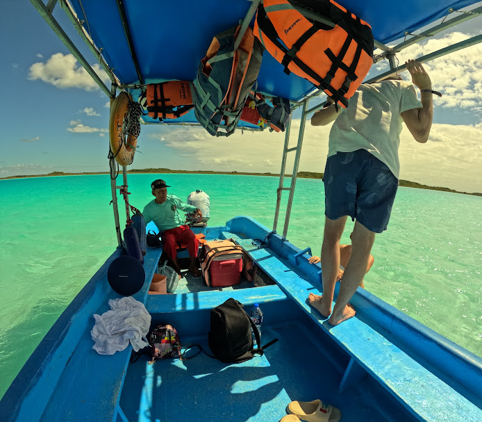 Private boat tour in Tulum's turquoise waters
